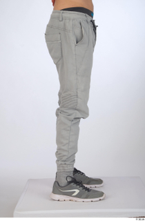 Turgen casual dressed grey sneakers grey trousers leg lower body…